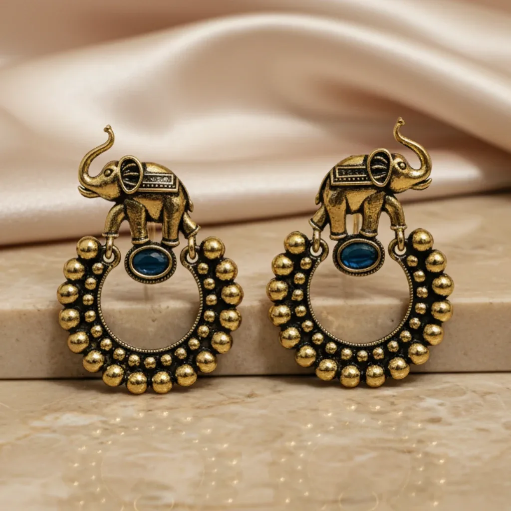 Antique Elephant Statement Earrings with Blue Accent